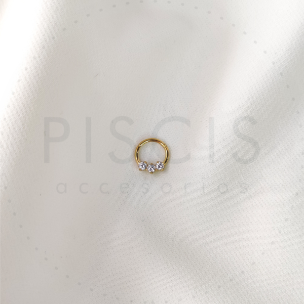 Piercing clicker 3 strass, dorado.