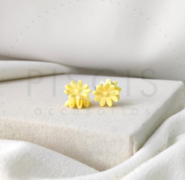 Ganchitos florcitas amarillos.