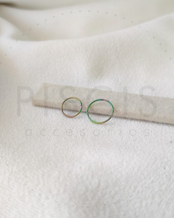 Piercing sin fin tornasol.