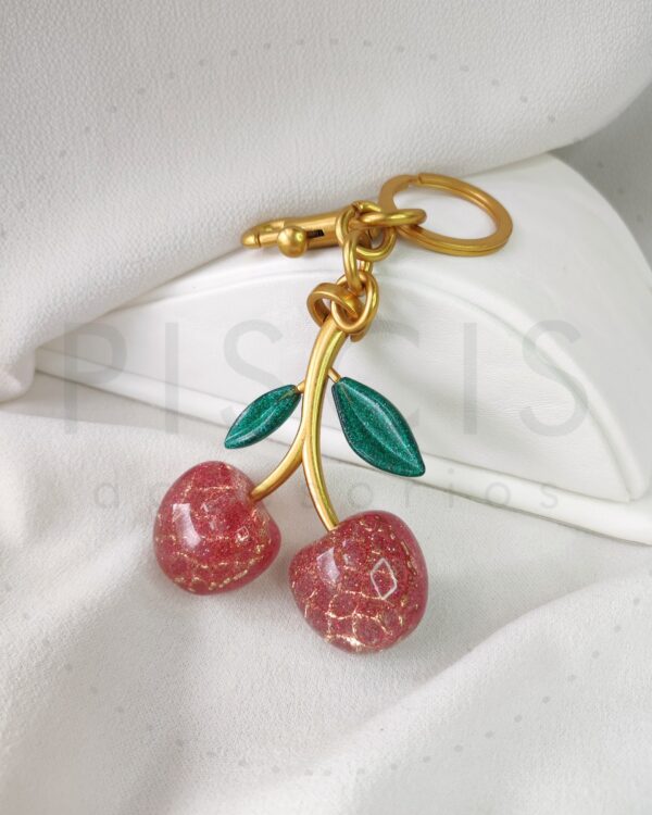 Charm Cherry rosa, dorado.