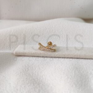 Piercing Labret doble curvo con strass, dorado.