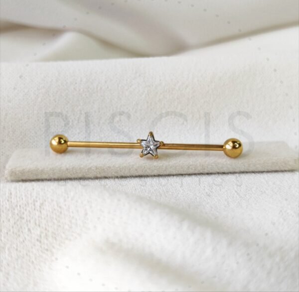 Piercing barra strass estrella, dorada.