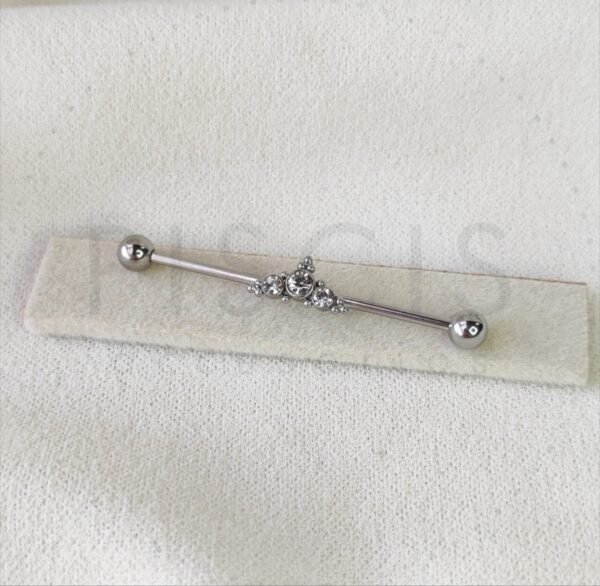 Piercing barra strass + bolitas, plateada.