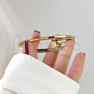 Brazalete Clavo Cartier, dorado.