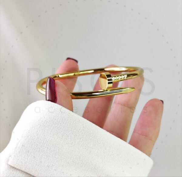 Brazalete Clavo Cartier, dorado.