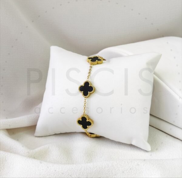 Pulsera Alhambra negra, dorada.