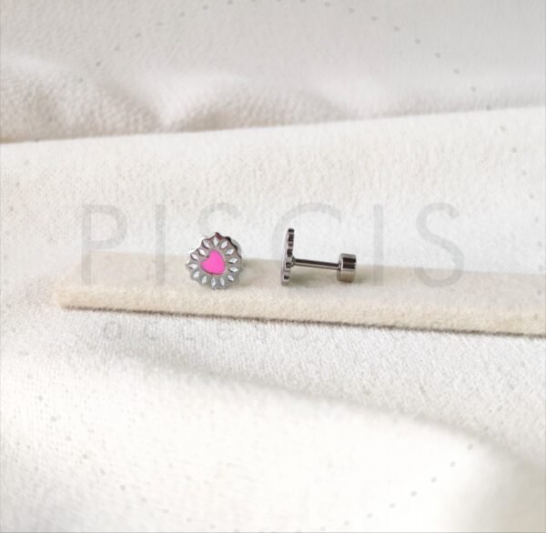 Aros Cori sparkles rosas con blanco, plateados.