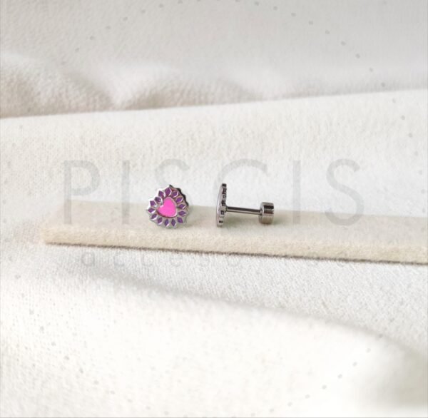 Aros Cori sparkles rosas con violeta, plateados.