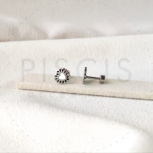 Aros Cori sparkles blancos con negro, plateados.