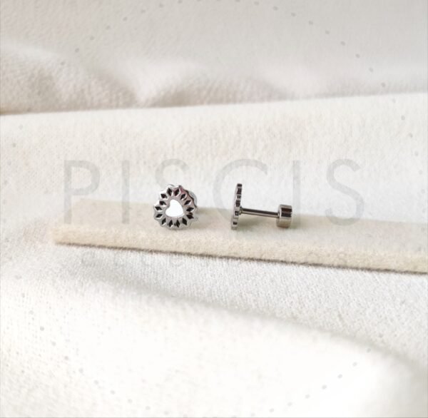 Aros Cori sparkles blancos con negro, plateados.