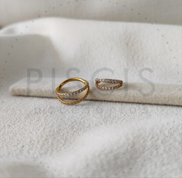 Piercing clicker con strass doble, dorado.