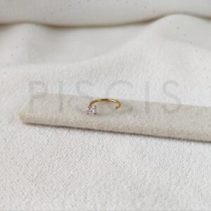 Piercing sin fin con tope strass, dorado.