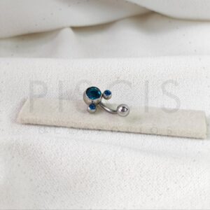 Piercing ombligo Mickey turquesa.