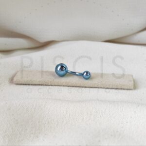 Piercing ombligo, celeste.