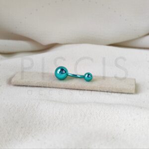 Piercing ombligo, turquesa.
