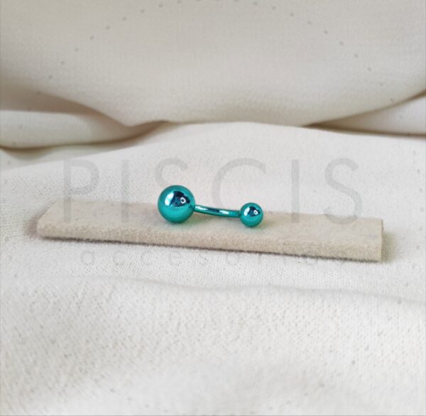 Piercing ombligo, turquesa.