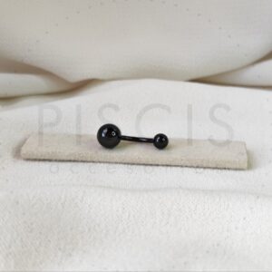 Piercing ombligo, negro.