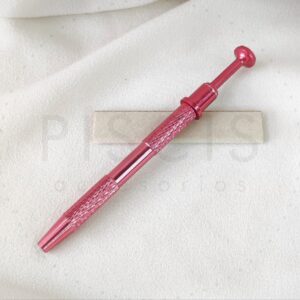 Pinza para piercings, rosa.