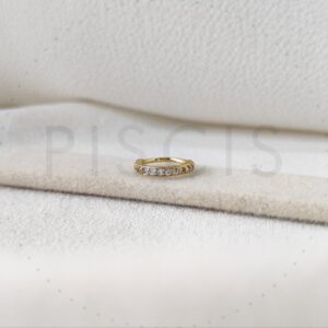 Piercing sin fin con strass, dorado.