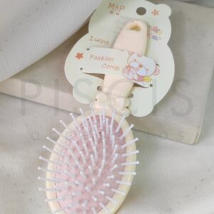 Cepillo chico moño - naranja pastel.