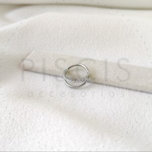 Piercing clicker doble, labrado y liso, plateado.