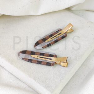 Pack x2 hebillas Skincare, cuadrille marrones.