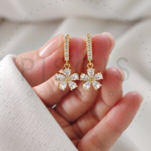 Arg. Florcitas strass blanco, doradas.