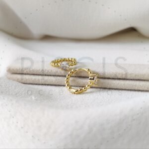 Arg. strass + bolitas, dorado.